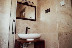 Koupelna v ubytování Fitromax Apartmanház