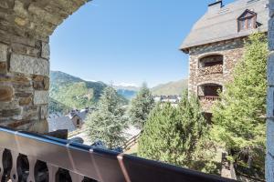 a view from the balcony of a castle at Egua by Totiaran in Naut Aran