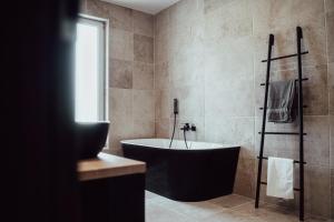 Koupelna v ubytování Fitromax Apartmanház