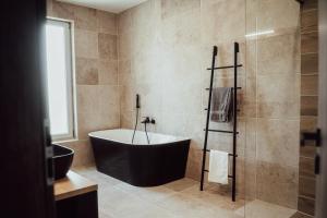 Koupelna v ubytování Fitromax Apartmanház