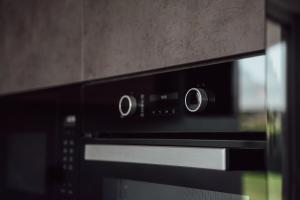Kuchyň nebo kuchyňský kout v ubytování Fitromax Apartmanház