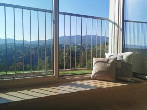 Nespecifikovaný výhled na hory nebo výhled na hory při pohledu z prázdninového domu