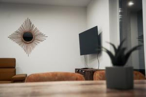 TV a/nebo společenská místnost v ubytování Fitromax Apartmanház
