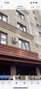 a picture of a building with a air conditioner at Apartament in the center of Chisinau in Chişinău