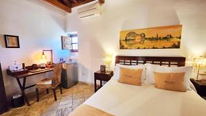 Postel nebo postele na pokoji v ubytování Entre Dos Aguas Hotel Boutique + 37 fotografií
