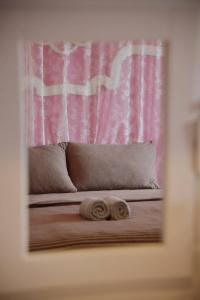 เตียงในห้องที่ Botan Boutique Hotel