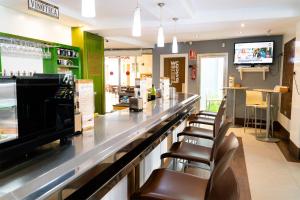 TV a/nebo společenská místnost v ubytování Pensión Restaurante Casablanca