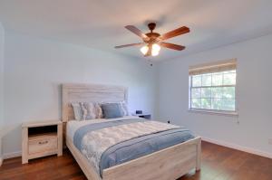 a bedroom with a bed and a ceiling fan at Picturesque Page Home Near Lake Powell and Hiking! in Page