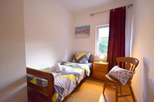 Postel nebo postele na pokoji v ubytování Apartments Cindric