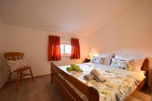 Postel nebo postele na pokoji v ubytování Apartments Cindric