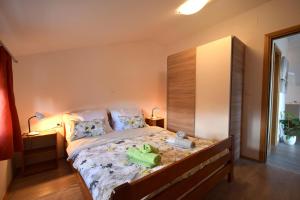 Postel nebo postele na pokoji v ubytování Apartments Cindric