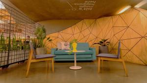 Χώρος καθιστικού στο Hotel El Peñon by Bithotels