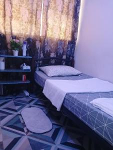 Postel nebo postele na pokoji v ubytování Single Room Near "World Trade Centre&Beach" Abudhabi