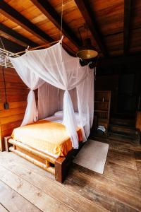 Кровать или кровати в номере La Martina Ecolodge