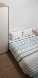 Cama ou camas em um quarto em Apartamento Puerto con Piscina