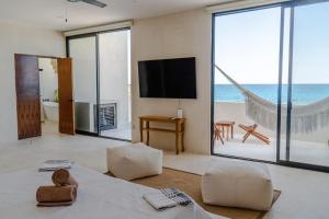 TV a/nebo společenská místnost v ubytování Villa Saadhu with fantastic oceanview