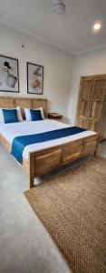 Postel nebo postele na pokoji v ubytování Serenova by Dia Hotels