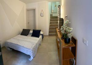Katil atau katil-katil dalam bilik di CasaBella Chioggia casa indipendente con corte