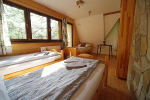 Posteľ alebo postele v izbe v ubytovaní Ski House Szczyrk - Solisko