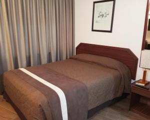 Postel nebo postele na pokoji v ubytování Hotel Alcala del Rio