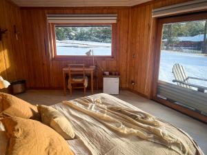 Ліжко або ліжка в номері Peuma Lodge Patagonia