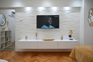 Телевізор і / або розважальний центр в Stan na dan Golden apartman