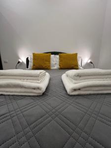 Postel nebo postele na pokoji v ubytování Citywise Vittorio - Independent Apartment near Bari central station