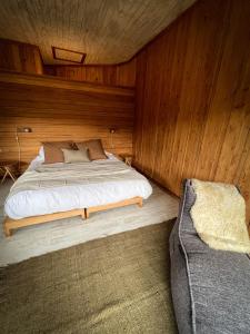 Ліжко або ліжка в номері Peuma Lodge Patagonia