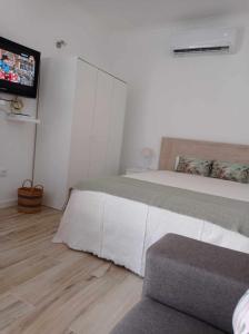Μια τηλεόραση ή/και κέντρο ψυχαγωγίας στο Casinha2 +4 φωτογραφίες
