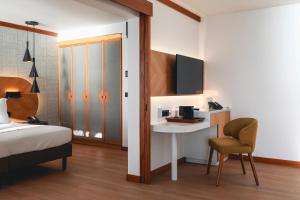 Ein Bett oder Betten in einem Zimmer der Unterkunft Le Tahiti by Pearl Resorts