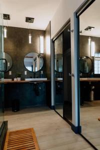 a bathroom with a sink and a mirror at *Msg for 5%off*2Bed2Bath KingBeds MidtownPHX Condo in Phoenix
