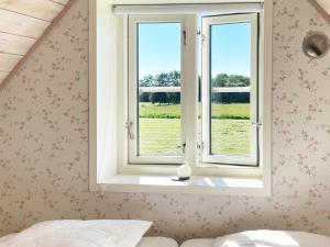 Ein Bett oder Betten in einem Zimmer der Unterkunft 5 person holiday home in Löderup-By Traum