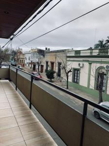 a view of a city street from a balcony at Sarmiento - 1A in Concordia