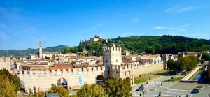 a view of a city with a castle at Garden House Soave in Soave