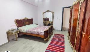 Postel nebo postele na pokoji v ubytování North Coast sedra resort Villa, قرية سيدرا الساحل الشمالي