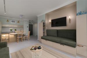 TV a/nebo společenská místnost v ubytování Apartament Riviera Spa