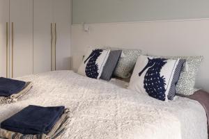 Postel nebo postele na pokoji v ubytování Apartament Riviera Spa + 14 fotografií