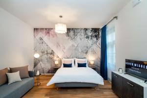 Posteľ alebo postele v izbe v ubytovaní Seven Wishes Boutique Residence by Dwellfort