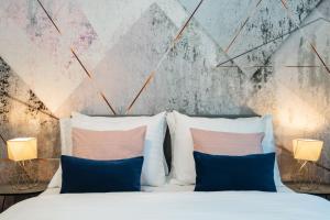 Posteľ alebo postele v izbe v ubytovaní Seven Wishes Boutique Residence by Dwellfort