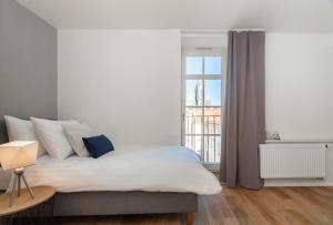 Posteľ alebo postele v izbe v ubytovaní Seven Wishes Boutique Residence by Dwellfort