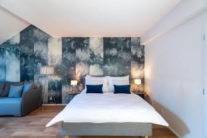 Posteľ alebo postele v izbe v ubytovaní Seven Wishes Boutique Residence by Dwellfort