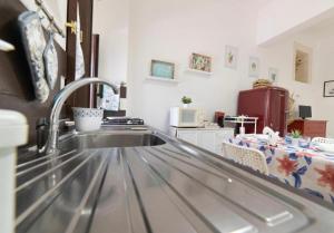 Kuchyň nebo kuchyňský kout v ubytování Alceo apartment + 26 fotografií