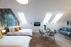 Posteľ alebo postele v izbe v ubytovaní Seven Wishes Boutique Residence by Dwellfort