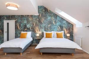 Posteľ alebo postele v izbe v ubytovaní Seven Wishes Boutique Residence by Dwellfort