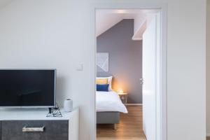 Posteľ alebo postele v izbe v ubytovaní Seven Wishes Boutique Residence by Dwellfort