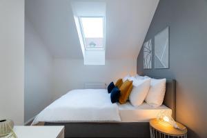 Posteľ alebo postele v izbe v ubytovaní Seven Wishes Boutique Residence by Dwellfort