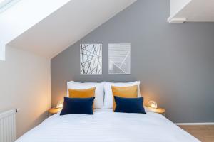 Posteľ alebo postele v izbe v ubytovaní Seven Wishes Boutique Residence by Dwellfort