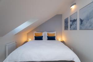 Posteľ alebo postele v izbe v ubytovaní Seven Wishes Boutique Residence by Dwellfort