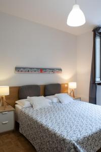 En eller flere senger på et rom på Al Ducato Guest House