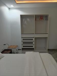 Ein Bett oder Betten in einem Zimmer der Unterkunft هدي هوم 2